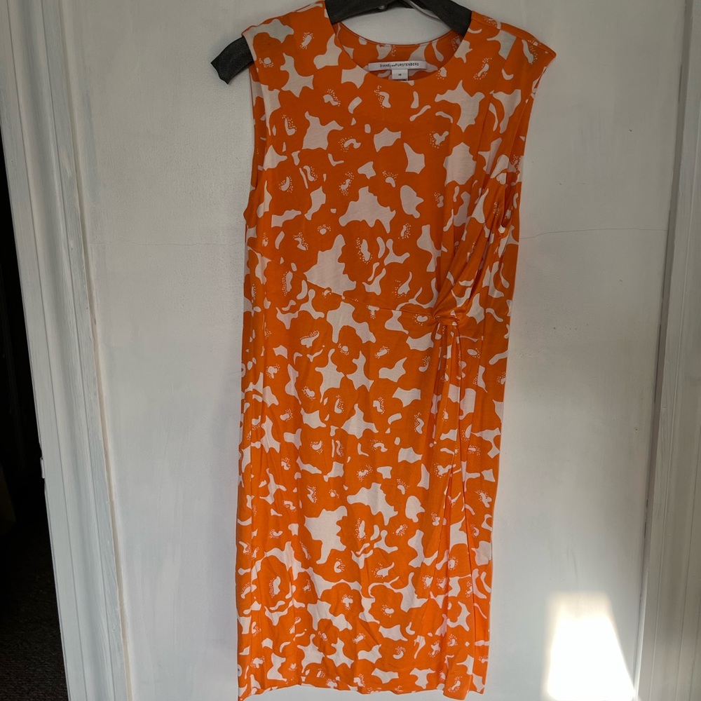 Never worn Diane von Furstenberg size 10 shift dress. Tangerine and white print